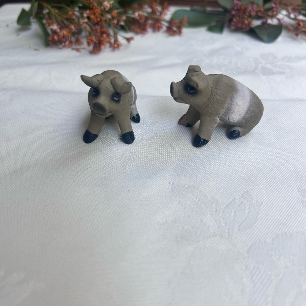 Pair of Small Gray Ceramic Pig Figurines with Black Hooves